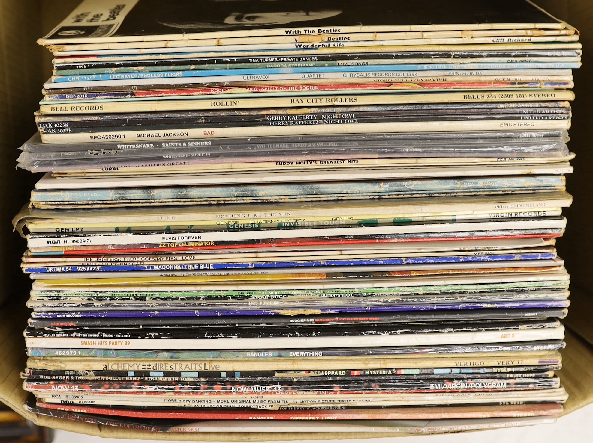 A collection of LP record albums and 12” singles (approx 50), artists include; the Beatles, Cliff Richard, Barbra Streisand, Michael Jackson, Whitesnake, Sting, Madonna, Def Leppard, Tina Turner, Leo Sayer, Ultravox, etc